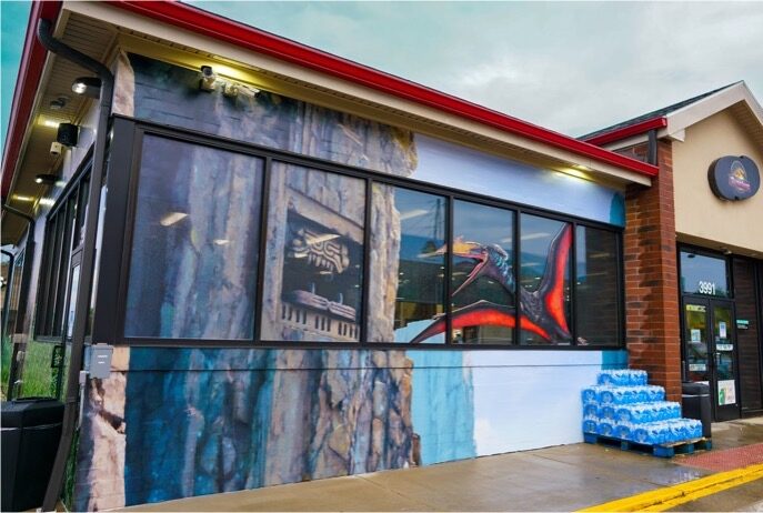 7-Eleven Jurassic World dinosaur window graphics takeover